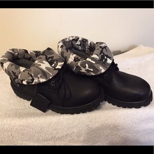 Boys black and fatigue Timberland boots (size 5)